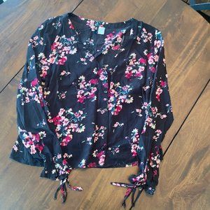 Black and floral long sleeved cropped shirt